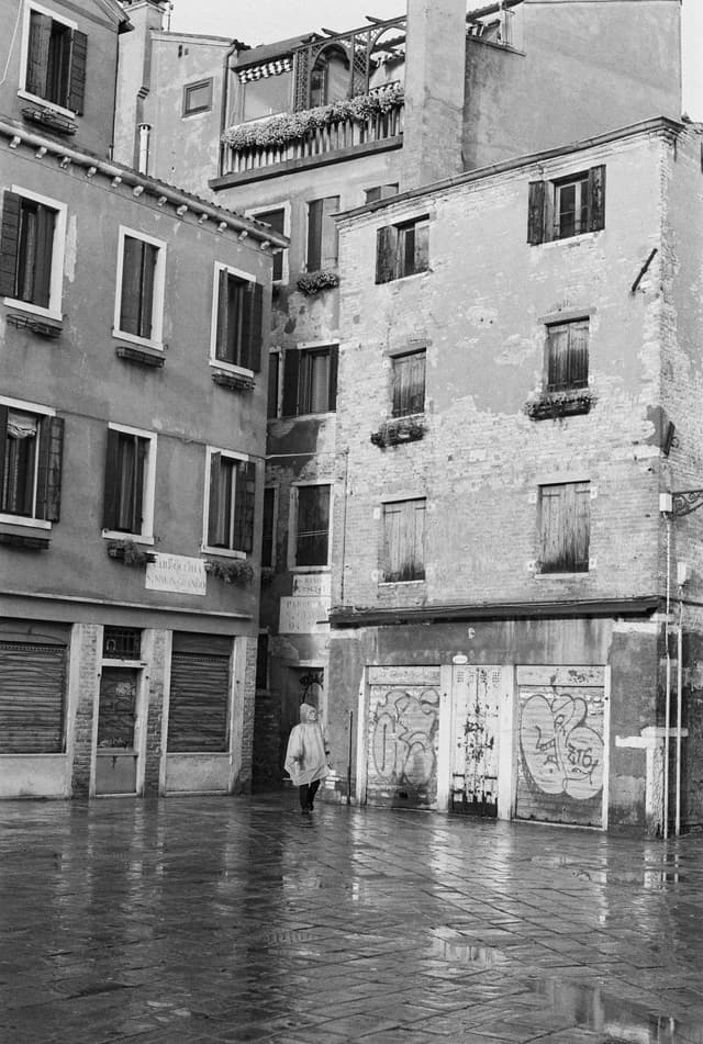 Person standing in the rain